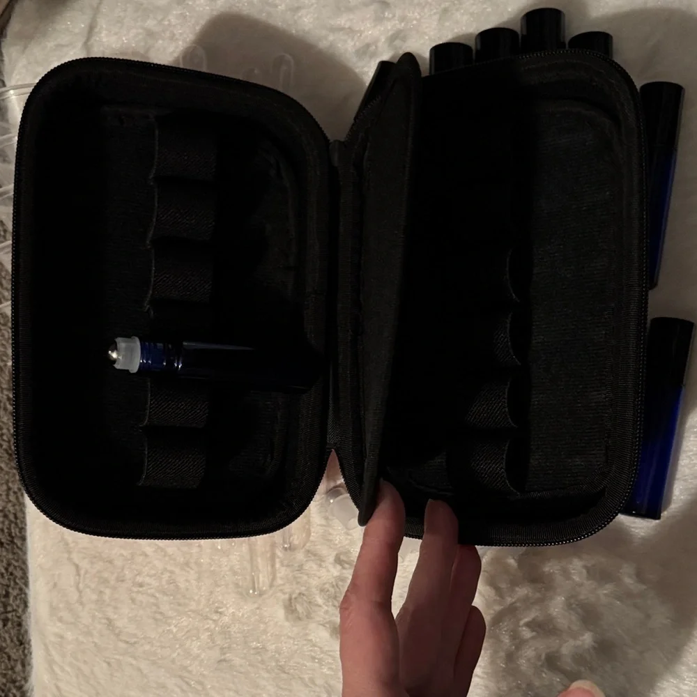 Pink and Black Travel Case with 12 Blue Roll On Bottles with Funnels Pipettes